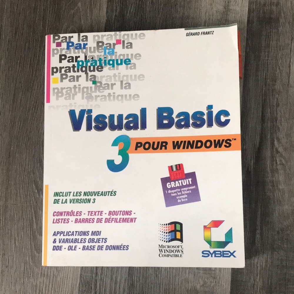 Microsoft Visual Basic 3 for Windows Manual – White with Blue and Orange Accents